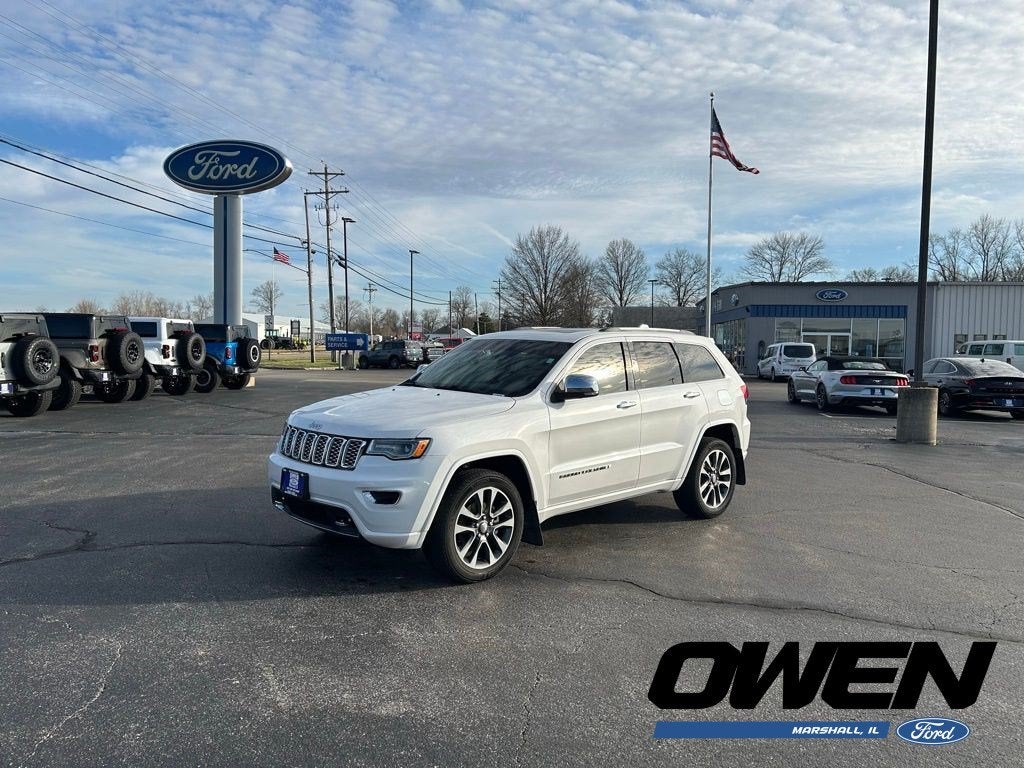 2017 Jeep Grand Cherokee Overland in Ivory 3-Coat — front three-quarter view