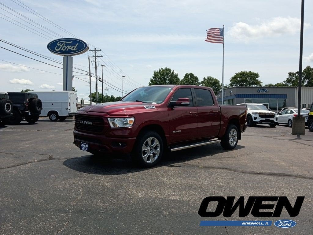 2019 RAM 1500 Big Horn/Lone Star in Delmonico Red Pearlcoat — front three-quarter view