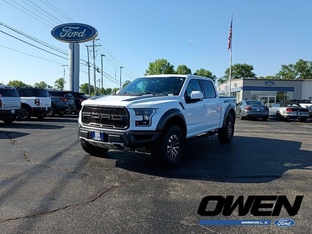 2019 Ford F-150 Raptor in Oxford White — front three-quarter view